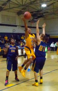 William Penn's Orielle Thomas attacks the basket for 2 of her 13 points in the Lady Statesmen's win over Clarke February 24, 2011