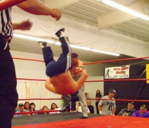 Tommy Ace body slams Blue Rocket during a recent CEW match