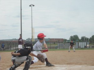 Noah Van Veldhuizen is at bat and lands himself a single to start out a inning on Sunday afternoon. (photo submitted)