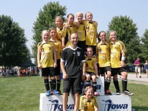 Bottom: LIndsay Breon Middle Row: Madysen Wade, Sarah Semini, Coach Dini Semini, Karson Swim, Kirby Nelson, and Lindsey Holmberg Top Row: Aleeya Cheney, Emily Lunsford, Brooke Engelhardt, and Maddy Crile