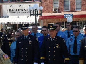Local fire departments take their place at the memorial service on Sunday