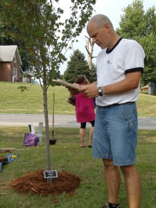 Bill Clark of Project 52 reads from Psalm 52 during the dedication ceremony