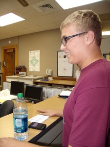 Charlie Comfort stands in the Mahaska County Auditors office shortly after the rsults were announced Tuesday evening