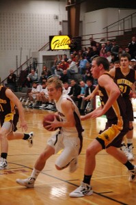 Dillion Daniel drives to the hoop in action against Mt. Pleasant Tuesday night