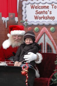 Jay Deaisley is seen here making his visit with Santa at Mahaska Drug Saturday afternoon