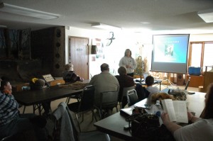 Mahaska County Naturalist Laura DeCook talks about Chief Mahaska to a group of visitors to Russel Wildlife Center Saturday