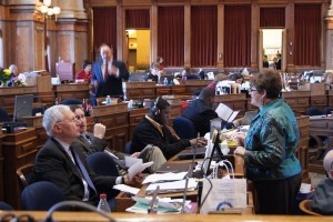 Rep. Guy Vander Linden (R-Oskaloosa) (left) and Rep. Betty De Boef (R-What Cheer) (right) speak on the floor of the Iowa House Tuesday afternoon
