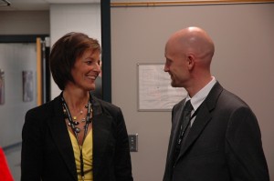 Kaye De Lange (Plant Manager of Cargill - left) and Michael Schrock (Oskaloosa City Manager - Right) at Friday's Legislative Day (photo by Ginger Allsup)