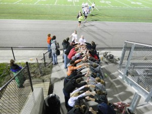 Students formed this tunnel for the girls soccer team after their recent victory