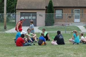 Participants at the 'Have Fun Take Charge' camp enjoy an old fashioned game of Duck Duck Goose.