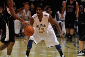 Brandon Beasley in action against Central Christian (Mo.)as the Statesmen basketball team won 140-53.