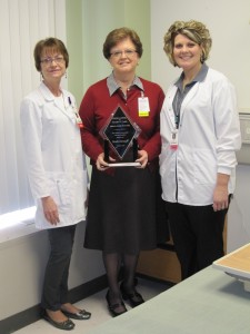 Shown with the Excellence in Patient Care Award are Inpatient Services Director Diana Sherman, Chief Nursing Officer Darlene Keuning and Birthing Center Director Chyann Vroegh.