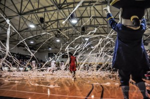 After the first basket by William Penn against Grand View, tradition takes over as TP filled the gym.