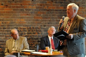 Larry Sheets (R) (Far Right) speaks at Eggs and Issues on Saturday.