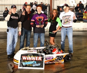 Racing these fast carts, carving out 5 second laps, Oskaloosa's Cayden Carter found the winners circle early in 2013 before heading off to the 'Chili Bowl' (submitted photo)