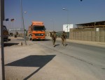 Sgt. George Toubekis (left) walks with a fellow soldier as they guard a fuel truck at Camp Marmal in Mazar-I-Sharif, Afghanistan. (submitted photo)