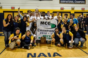 PennZone members pose with the William Penn Men's Basketball team after they clinched the MCC Championship. 
