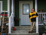 Alicia Groenendyk stands in front of her residence along Highway 163 near Leighton (photo by Don Hubbard/Oskaloosa News)