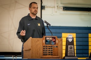 Head William Penn Men's Basketball Coach John Henry talks with supporters Thursday about the experience and the support they received on their journey.