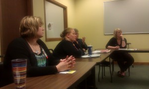 Local civic organizations listen to a presentation on providing summer meals to low-income children.