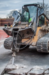 Ripping out the old concrete to make way for the new.