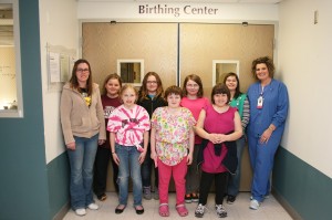 Girl Scout Troop 979 members dropped off special baskets to the MHP Birthing Center. The baskets are given to the first baby born each month. Shown in the front row are, from left:  Troop 979 Parent Helper Becky Sidebottom, Amerisi Winegar, Samantha Vanderhyde and Jade Ryan-Hysell. In the back frow, from left, are: Katelynn Moore, Alexis McCulley, Ariel Mullins, Alexis Sidebottom and MHP Birthing Center Director Chyann Vroegh. Not pictured: Katelyn Mundell, Lilly Harkin, Marilyn Thomas and Troop 979 Leader Crystal Mullins. (submitted photo)