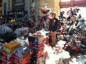 Morgane Cloesen is pictured with the donated shoes. (submitted photo)
