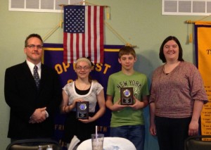 The Oskaloosa Optimist Club honored Shaylee Smith and Nick Reiter with these plaques Wednesday morning.