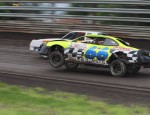 The Jeff Joldersma Racing entry pulls the front tire high into the air on a night the track was getting lots of traction. photo by Denis Currier/Oskaloosa News