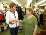 Cheryl Brown, left, Director of Agency on Aging accepts check from Mahaska County Outreach store manager Alice Moore. (submitted photo)