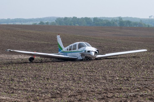 This Piper aircraft crashed Saturday around noon in rural Mahaska County. (photo by Ken Allsup/Oskaloosa News)