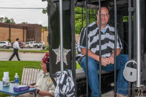 Another volunteer spends time in 'Jail' waiting to be bailed out.