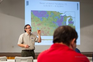 Dr. Dennis Todey, State and Extension Climatologist, South Dakota State University talks about weather forecasting to area farmers and business representatives at Nelson Pioneer Farm on Wednesday.
