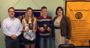 Alexis Westercamp and Seth Sarver were presented plaques by club president Andrea Brownlee and Oskaloosa Middle School Principal Andy Hotek. (submitted photo)