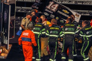 Pictured is NASCAR driver Tony Stewart being loaded into an ambulance at the Southern Iowa Speedway in Oskaloosa after an accident at the Front Row Challenge Monday Night (photo by Denis Currier/Oskaloosa News)