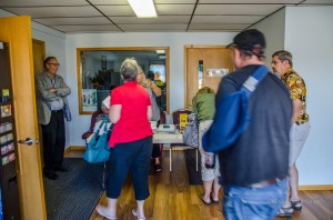 Participants sign in to the introduction to Medicare seminar held Wednesday night at the ISU Extension Office in Oskaloosa