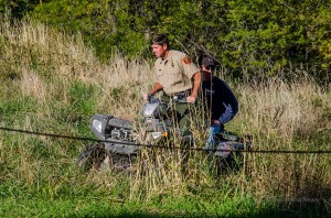Iowa DNR Officer Mike Ryan along with a volunteer search for the missing woman on Tuesday afternoon.