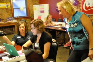 Volunteers work at registering teams for the upcoming Relay for Life event.