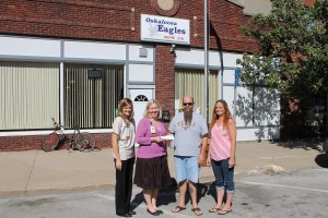 The Oskaloosa Eagles Lodge held a charity Bicycle Fun Run on Sept. 21. The event raised $500 to benefit the Mahaska Health Partnership Hospice Serenity House. Shown at the check presentation outside the Eagles Lodge are, from left: MHP Home Health and Hospice Director Anne Hildreth, MHP Chief Operating Officer Erin Baldwin, event organizer Phil Laud and committee member Rilla Williamson. Laud said he would like to thank all the businesses who donated to the event, as well as the participants. 