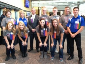 Back row left to right:  Dannitta Presley, Kim Gile, Stacy Bandy, Travis Gile, Ryder Curtis, Cody Tuttle, Gerrit Van Maanen. Front row left to right:  Tori Holthaus, Sarah Overbergen, Jacey Van Roekel, Sarandyn Curtis Members of the Oskaloosa Student Council Executive Board and their advisors pose with High School Principal Stacy Bandy at the State Leadership Conference where Mr. Bandy received the award for Administrator of the Year. (submitted photo)
