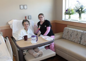 To celebrate National Patient Recognition Day on Feb. 3, patients were given a purple carnation and a thank-you card. Shown with her carnation is Mary Verploegh of Oskaloosa and Registered Nurse Audrianna Wilke. Mary, a former employee at MHP, also celebrated her 74th birthday this day and received special treats from her children.