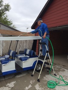 With the tour season starting, MCRF Volunteer Driver, Rex Blom, and MCRF staff spent almost 5 hours washing and waxing the customized trail trams on Friday. (submitted photo)