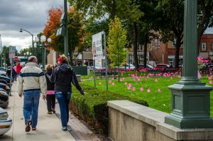 Walkers make their way around the square in downtown Oskaloosa for the 10th Annual Breast Cancer Awareness Walk hosted by Mahaska Health Partnership.