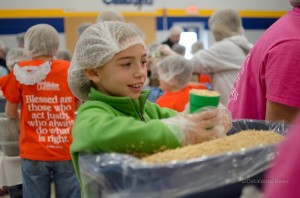 Students at Oskaloosa Christian School helped to package meals on Friday.