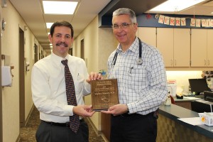 Dr. Stephen Mineart was named the 2014 MHP MVP (Most Valuable Provider) at Mahaska Health Partnership’s annual Provider Appreciation Dinner. He is presented his “Golden Stethoscope” award by Jay Christensen, MHP CEO (left).