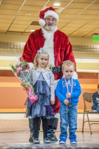2014 Young Ambassadors are; Addison VanderBeek (left), and Ayden Fynnardt (right), with Santa