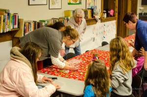 Lots of interest in making wax snowflakes at the Oskaloosa Public Library.