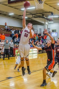 Wade Votroubek seen here scoring the final 2 points putting the Oskaloosa Boys Varsity team up 46-45. Votroubek then hustled back, picking up the block, helping to hold off Fairfield. 