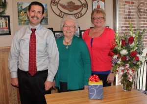 Dorothy Vos of Oskaloosa was recognized at the MHP Hospital Auxiliary Board Christmas lunch for her 50 plus years of service to the health system, both as a nurse and a volunteer.  The event was held at Tasos Restaurant in Oskaloosa.  Pictured, from left: MHP CEO Jay Christensen, Dorothy Vos, and Volunteer Coordinator Kim Langfitt. Upon Vos’ retirement, Langfitt will serve as the new manager of Whispering Tree Gifts, in addition to her other volunteer coordinator responsibilities. 