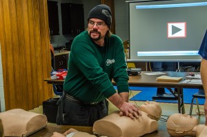 Mahaska CERT Captain Jeff Ridenour teaches community members CPR on Saturday at the Mahaska County YMCA.